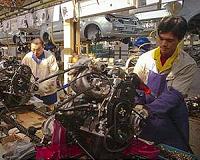 China's factory activity rebounds but threat from virus looms