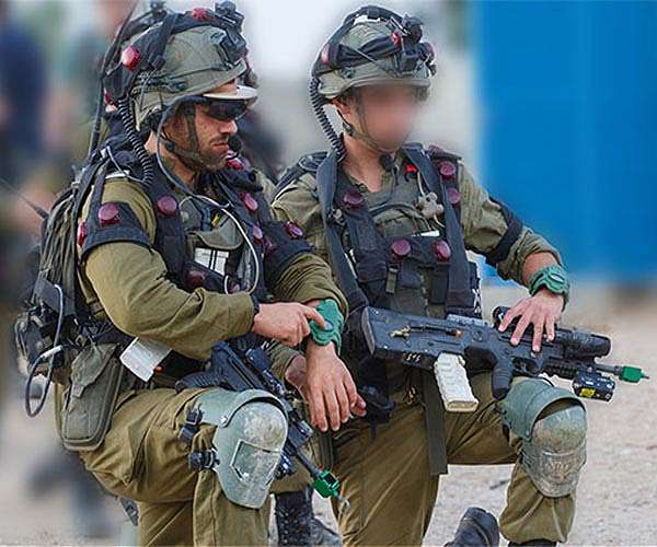 With dreadlocks, hipster beards, Israel reservists called to war
