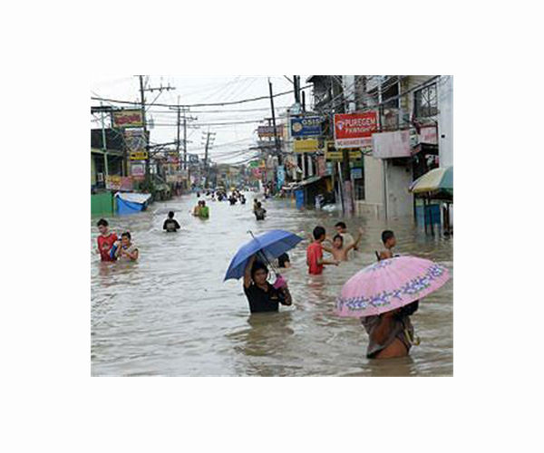 Philippines flooding displaces thousands as new storm threatens