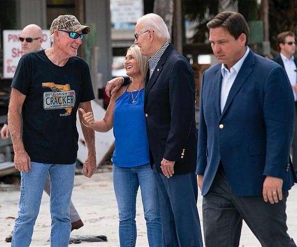 Biden tours Florida hurricane clean-up zone -- and opponent's territory