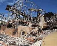 Bushfire-hit Australians still in tents as virus slows recovery