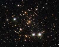 Hubble captures a dozen sunburst arc doppelgangers