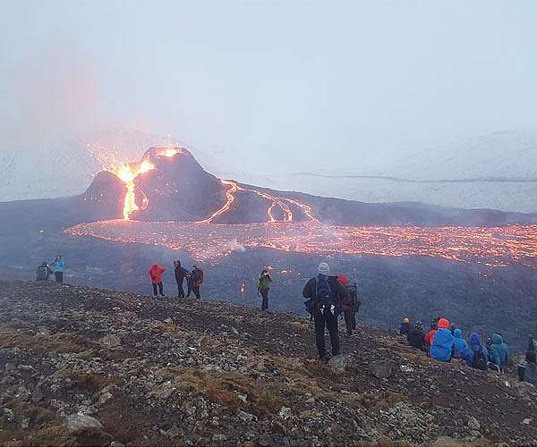 'Indescribable': the heat and roar of Iceland's volcano as spectators flock to watch