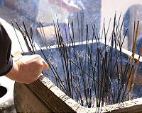 Thousands protest call to curb incense burning in Taiwan
