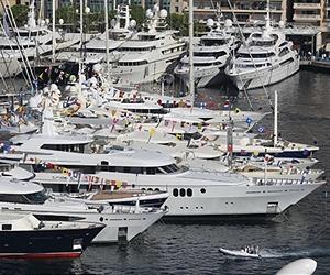 Luxury yachts fly the green flag