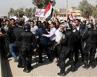 Protests grip Iraq's capital and south despite rising toll