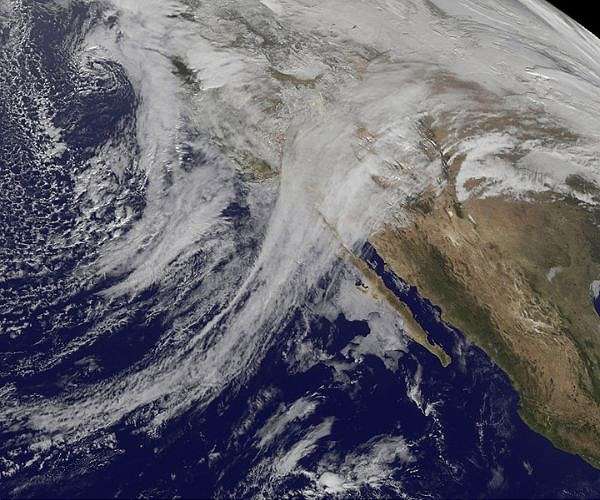 California scrambles to fix levee as another storm looms
