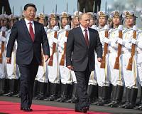 'Good gifts': Putin presents Xi with birthday ice cream