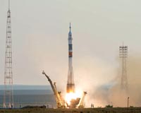 Three astronauts blast off for ISS in upgraded Soyuz craft