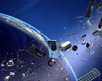 Two defunct satellites narrowly miss collision: officials