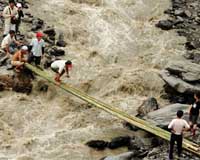 Bamboo bridge links Taiwanese villagers' typhoon wasteland