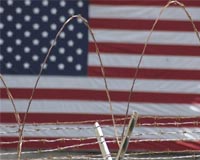 Analysis: Who wants 60 Gitmo inmates?
